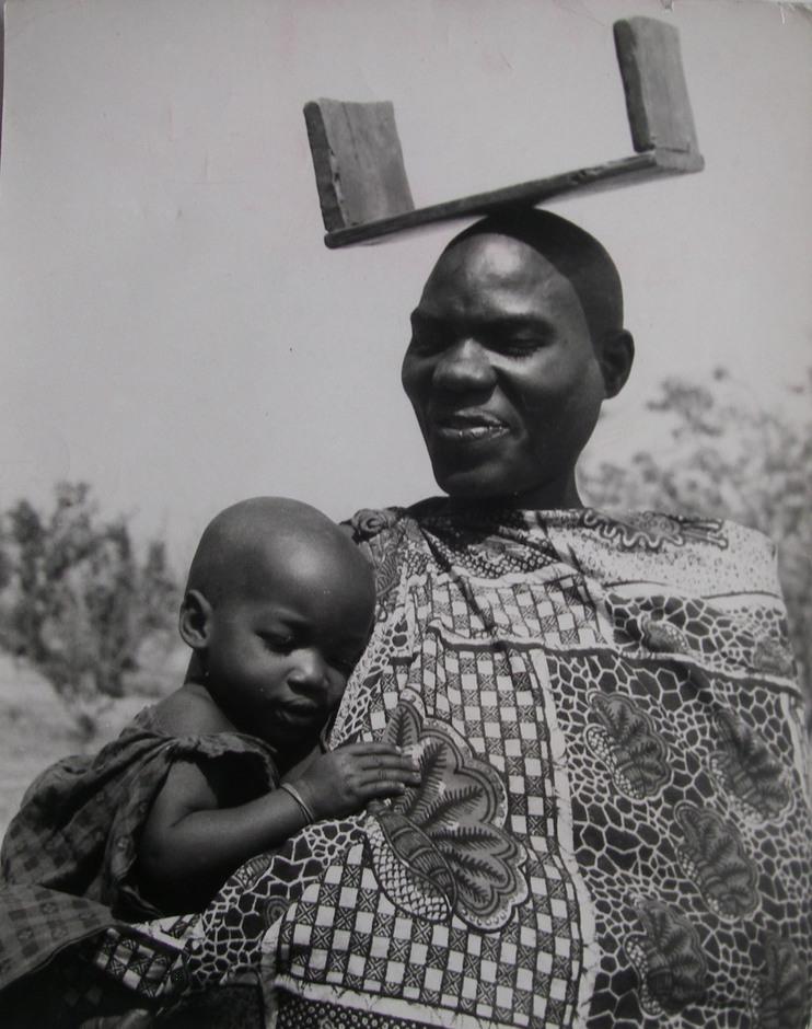 untitled (woman carrying a child)