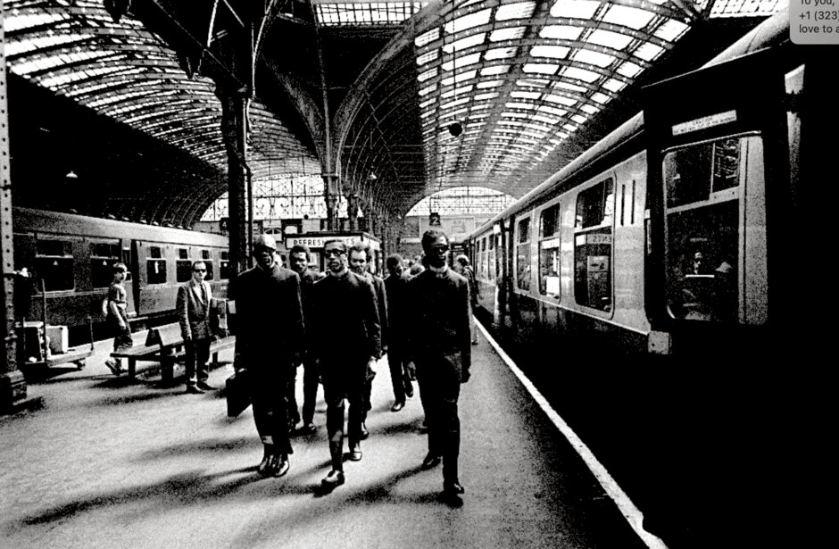 Michael X and Entourage in Paddington Station